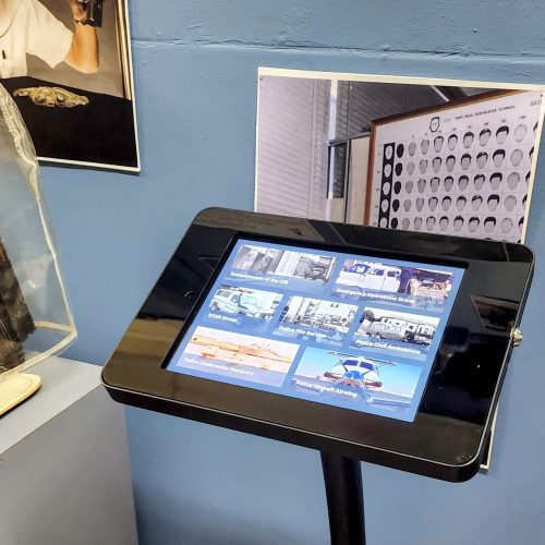 An iPad museum kiosk with 7 large image buttons